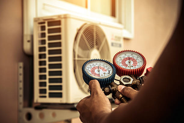 Professional Hvac technician working in Minot, MA